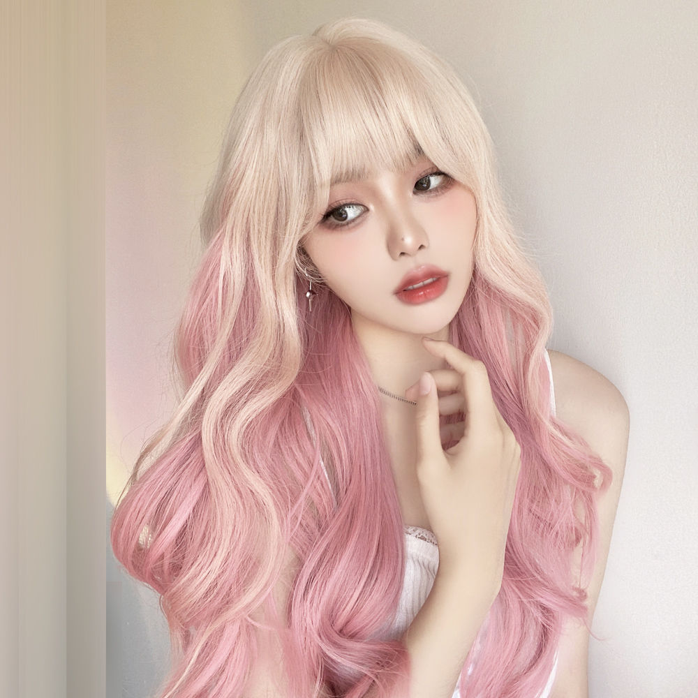 Trendy and stylish lolita ombre wavy full-head wig for women in platinum ombre cherry blossom pink long curly hair.
