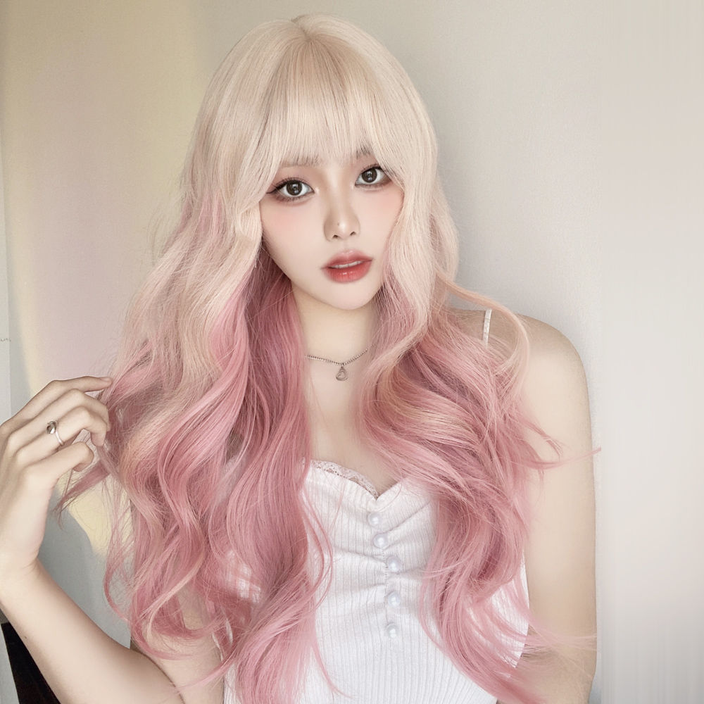 Trendy and stylish lolita ombre wavy full-head wig for women in platinum ombre cherry blossom pink long curly hair.